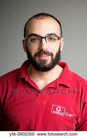 Tilburg, Netherlands. Portrait on location of a Syrian refugee, waiting entlessy for his registration. View Large Photo Image Stock Image - Tilburg, Netherlands. Portrait on location of a Syrian refugee, waiting entlessy for his registration.. Fotosearch