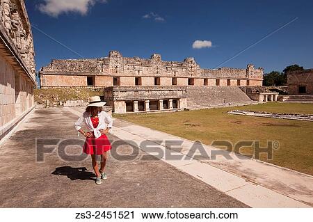 Tourist a the Quadrangle Of The Nuns in Uxmal Ruins, Uxmal, Yucatan Province, Mexico, Central America. View Large Photo Image Stock Image - Tourist a the Quadrangle Of The Nuns in Uxmal Ruins, Uxmal, Yucatan Province, Mexico, Central America.. Fotosearch