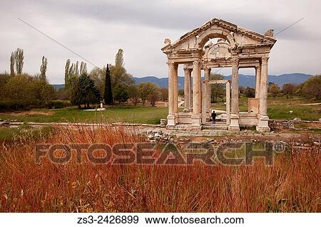 Tourist at the antique Tetrapylon in the ancient ruins of Aphrodisias, Aydin Province, Aegean Coast, Turkey, Europe. View Large Photo Image Stock Photo - Tourist at the antique Tetrapylon in the ancient ruins of Aphrodisias, Aydin Province, Aegean Coast, Turkey, Europe.. Fotosearch