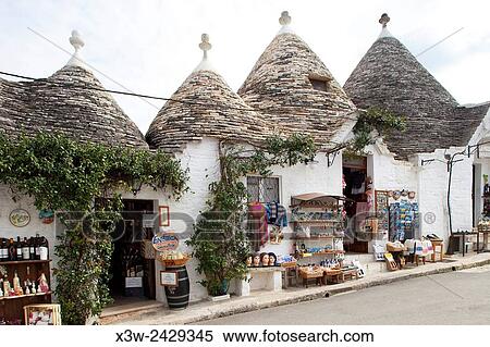 tourist shop, Rione Monti, Trulli, Alberobello village, province of Bari, Puglia, Italy, Europe. View Large Photo Image Stock Photography - tourist shop, Rione Monti, Trulli, Alberobello village, province of Bari, Puglia, Italy, Europe.. Fotosearch