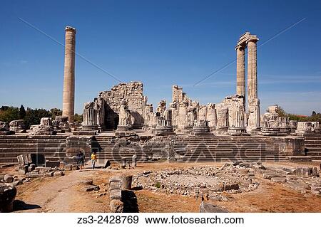 Tourists at the Temple of Apollo at the Archeological area of Didim, Didyma, Aydin Province, Turkey, Europe. View Large Photo Image Stock Photo - Tourists at the Temple of Apollo at the Archeological area of Didim, Didyma, Aydin Province, Turkey, Europe.. Fotosearch