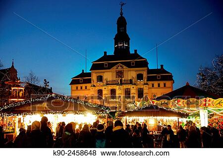 Town hall with Christmas Market and crowds of people, old houses and Christmas decoration, Lueneburg, Lower Saxonya, Germany, Europe. View Large Photo Image Stock Photo - Town hall with Christmas Market and crowds of people, old houses and Christmas decoration, Lueneburg, Lower Saxonya, Germany, Europe.. Fotosearch