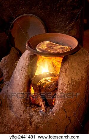 Stock Image - Traditional Berber kitchen. Ourica Valley, Morocco.. Fotosearch