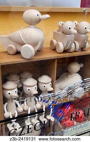 Stock Image - Traditional Czech handmade wooden toys in a shop window, Prague, Czech Republic, Europe.. Fotosearch