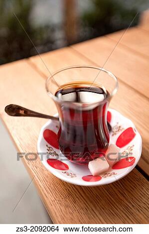 Picture - Traditional Turkish tea cup on the table in Grand Bazaar, Sultanahmet, Istanbul, Turkey,.. Fotosearch