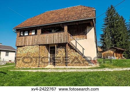 Stock Photo - Traditional villages at Notranjska area in southwestern Slovenia, Europe.. Fotosearch