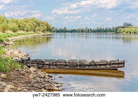 Traditional wooden fishing boat, Vistula river, Mlociny, Poland. View Large Photo Image Stock Photography - Traditional wooden fishing boat, Vistula river, Mlociny, Poland.. Fotosearch