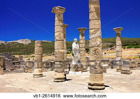 Trajan statue and Basilica at the Roman ruins of Baelo Claudia in Bolonia beach, Tarifa, Cadiz, Andalusia, Spain. View Large Photo Image Stock Photograph - Trajan statue and Basilica at the Roman ruins of Baelo Claudia in Bolonia beach, Tarifa, Cadiz, Andalusia, Spain.. Fotosearch