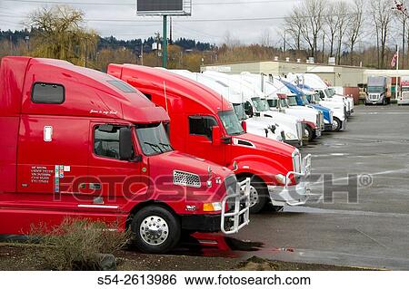 Stock Photograph - Trucks at a truck stop near the Port of Tacoma, Washington State, USA.. Fotosearch