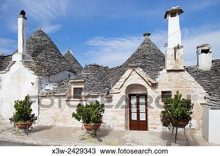 Trulli, Alberobello village, Rione Aia Piccola, province of Bari, Puglia, Italy, Europe. View Large Photo Image Stock Image - Trulli, Alberobello village, Rione Aia Piccola, province of Bari, Puglia, Italy, Europe.. Fotosearch