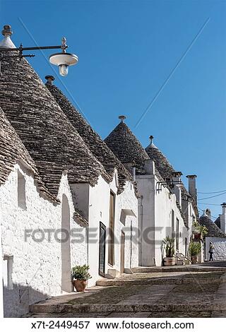 Trulli houses at Alberobello, Puglia, Italy. View Large Photo Image Stock Photo - Trulli houses at Alberobello, Puglia, Italy.. Fotosearch