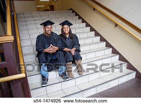 Two young african-american graduates View Large Photo Image Stock Photograph - Two young african-american graduates. Fotosearch