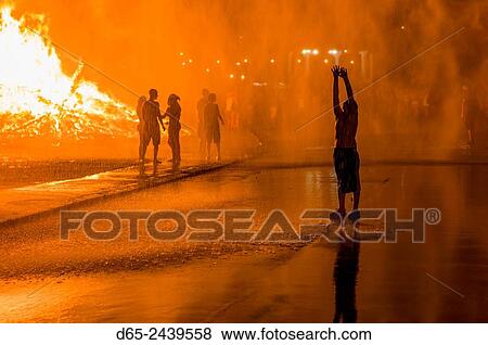 USA, Massachusetts, Cape Ann, Rockport, Fourth of July, Independence Day Bonfire, silhouettes. View Large Photo Image Stock Photo - USA, Massachusetts, Cape Ann, Rockport, Fourth of July, Independence Day Bonfire, silhouettes.. Fotosearch