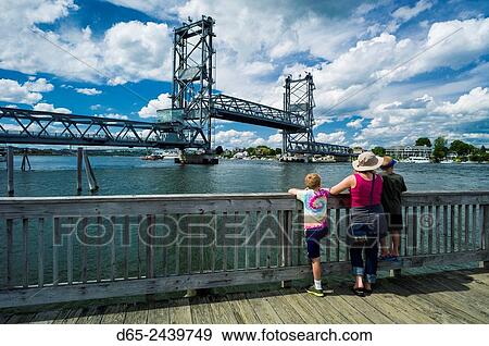 USA, New Hampshire, Portsmouth, family near Memorial Bridge, US Route 1. View Large Photo Image Stock Photo - USA, New Hampshire, Portsmouth, family near Memorial Bridge, US Route 1.. Fotosearch