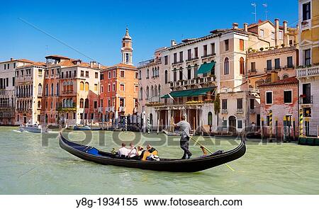 Stock Photography - Venice - Grand Canal (Canal Grande), gondola with tourists on the canal, Venice, Italy, UNESCO.. Fotosearch