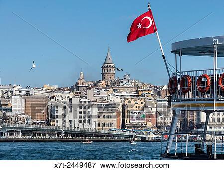 View from Eminonu across the Golden Horn toward Galata bridge with Galata tower and Beyoglu on the Istanbul skyline. Istanbul, Turkey. View Large Photo Image Stock Photo - View from Eminonu across the Golden Horn toward Galata bridge with Galata tower and Beyoglu on the Istanbul skyline. Istanbul, Turkey.. Fotosearch