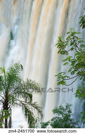 Stock Image - View of Eva and Bossetti Falls, one of the waterfalls of Iguassu Falls on the Argentine side of Iguassu National Park.. Fotosearch