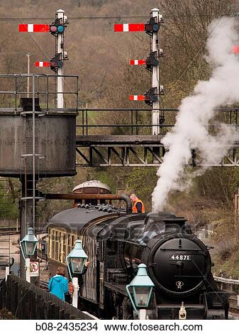 vintage steam locomotive 44871 LMS at Grosmont station, on The North Yorkshire Moors Railway, Yorkshire, UK. View Large Photo Image Picture - vintage steam locomotive 44871 LMS at Grosmont station, on The North Yorkshire Moors Railway, Yorkshire, UK.. Fotosearch