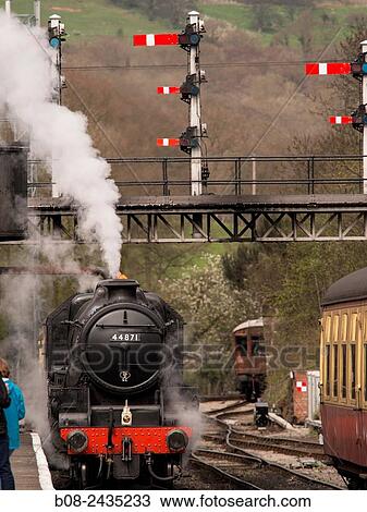 vintage steam locomotive 44871 LMS at Grosmont station, on The North Yorkshire Moors Railway, Yorkshire, UK. View Large Photo Image Stock Image - vintage steam locomotive 44871 LMS at Grosmont station, on The North Yorkshire Moors Railway, Yorkshire, UK.. Fotosearch