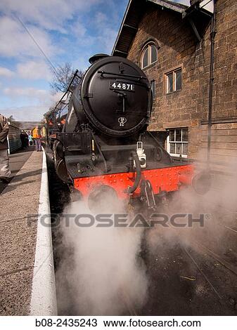 vintage steam locomotive 44871 LMS at Grosmont station, on The North Yorkshire Moors Railway, Yorkshire, UK. View Large Photo Image Stock Image - vintage steam locomotive 44871 LMS at Grosmont station, on The North Yorkshire Moors Railway, Yorkshire, UK.. Fotosearch