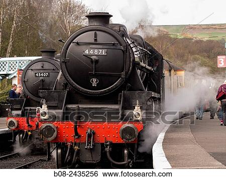 Stock Photograph - vintage steam locomotive 44871 LMS at Grosmont station, on The North Yorkshire Moors Railway, Yorkshire, UK.. Fotosearch