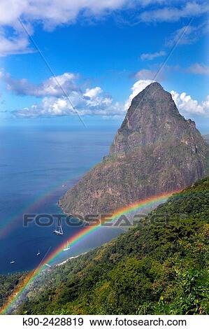 Vista of Petit Piton and the Caribbean Sea with clouds, St Lucia, Windward Islands, Lesser Antilles, Eastern Caribbean Islands, West Indies, Americas. View Large Photo Image Stock Photo - Vista of Petit Piton and the Caribbean Sea with clouds, St Lucia, Windward Islands, Lesser Antilles, Eastern Caribbean Islands, West Indies, Americas.. Fotosearch