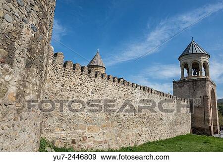 Walls and belltower of Svetitskhoveli (Living Pillar Cathedral) in Mtskheta city, Georgia. View Large Photo Image Stock Photo - Walls and belltower of Svetitskhoveli (Living Pillar Cathedral) in Mtskheta city, Georgia.. Fotosearch