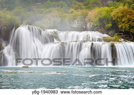 Waterfall with water cascades on the Krka River, Krka National Park, Croatia. View Large Photo Image Stock Image - Waterfall with water cascades on the Krka River, Krka National Park, Croatia.. Fotosearch