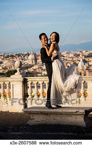 Wedding couple at Gianicolo. Rome. Italy. View Large Photo Image Stock Photo - Wedding couple at Gianicolo. Rome. Italy.. Fotosearch