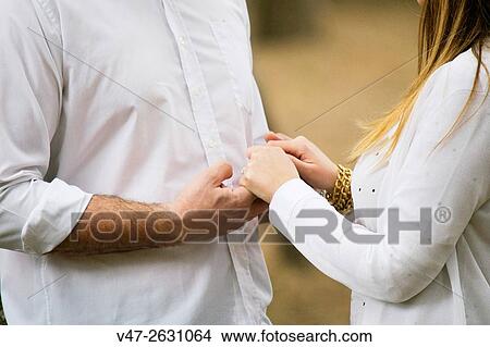 Wedding couple holding hands, Valencia, Spain, Europe View Large Photo Image Picture - Wedding couple holding hands, Valencia, Spain, Europe. Fotosearch