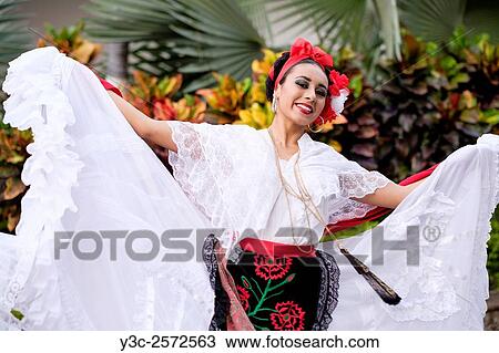 Woman dancing - Puerto Vallarta, Jalisco, Mexico. Xiutla Dancers - a folkloristic Mexican dance group in traditional costumes representing the culture and different regions of Mexico. View Large Photo Image Stock Image - Woman dancing - Puerto Vallarta, Jalisco, Mexico. Xiutla Dancers - a folkloristic Mexican dance group in traditional costumes representing the culture and different regions of Mexico.. Fotosearch