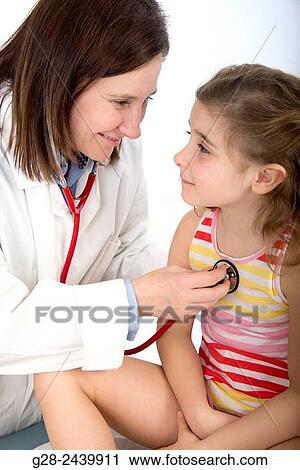 Woman Doctor auscultating little girl with her stethoscope in surgery View Large Photo Image Stock Image - Woman Doctor auscultating little girl with her stethoscope in surgery. Fotosearch