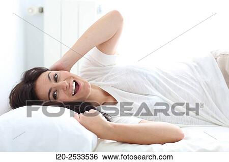 Woman in bed View Large Photo Image Stock Photograph - Woman in bed. Fotosearch