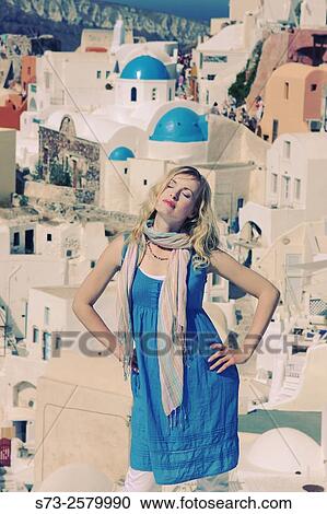 Woman in Oia, Santorini, Cyclades Islands, Greece View Large Photo Image Stock Image - Woman in Oia, Santorini, Cyclades Islands, Greece. Fotosearch