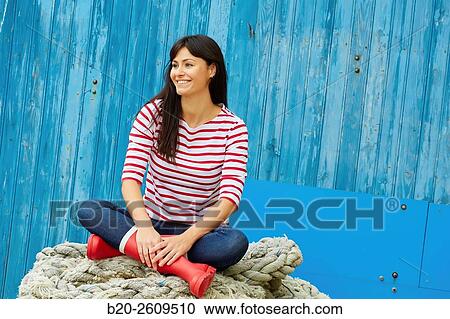 Woman in the fishing port. Getaria. Gipuzkoa. Basque Country. Spain View Large Photo Image Stock Image - Woman in the fishing port. Getaria. Gipuzkoa. Basque Country. Spain. Fotosearch