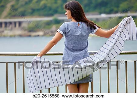 Woman in the marina. Port. Getaria. Gipuzkoa. Basque Country. Spain View Large Photo Image Stock Photo - Woman in the marina. Port. Getaria. Gipuzkoa. Basque Country. Spain. Fotosearch