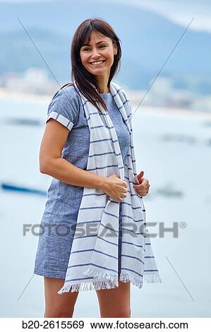 Woman in the marina. Port. Getaria. Gipuzkoa. Basque Country. Spain View Large Photo Image Stock Photo - Woman in the marina. Port. Getaria. Gipuzkoa. Basque Country. Spain. Fotosearch