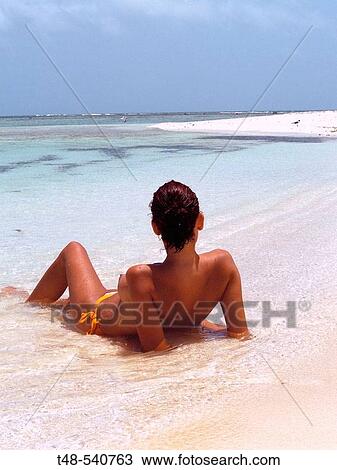 Woman on beach, Los Roques. Venezuela View Large Photo Image Stock Image - Woman on beach, Los Roques. Venezuela. Fotosearch