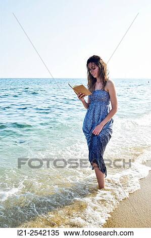 Woman on the beach View Large Photo Image Stock Photography - Woman on the beach. Fotosearch