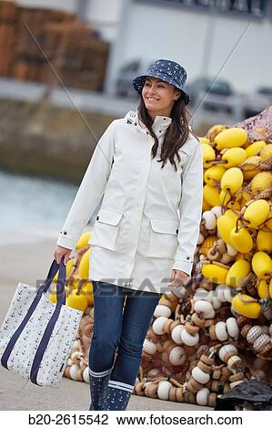 Woman walking in the fishing port. Getaria. Gipuzkoa. Basque Country. Spain View Large Photo Image Stock Image - Woman walking in the fishing port. Getaria. Gipuzkoa. Basque Country. Spain. Fotosearch