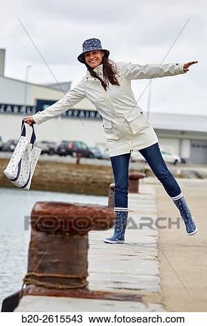 Woman walking in the fishing port. Getaria. Gipuzkoa. Basque Country. Spain View Large Photo Image Stock Image - Woman walking in the fishing port. Getaria. Gipuzkoa. Basque Country. Spain. Fotosearch
