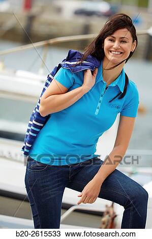 Woman walking in the marina. Port. Getaria. Gipuzkoa. Basque Country. Spain View Large Photo Image Stock Image - Woman walking in the marina. Port. Getaria. Gipuzkoa. Basque Country. Spain. Fotosearch