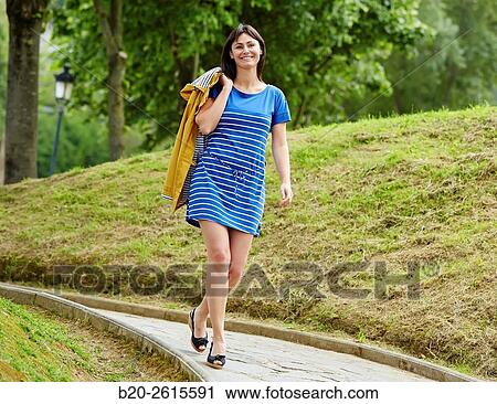 Woman walking in the park. Getaria. Gipuzkoa. Basque Country. Spain View Large Photo Image Stock Image - Woman walking in the park. Getaria. Gipuzkoa. Basque Country. Spain. Fotosearch