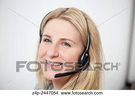 Woman with headset. View Large Photo Image Picture - Woman with headset.. Fotosearch