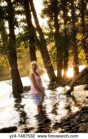 Young blonde woman outdoors in Spokane, Washington, USA. View Large Photo Image Stock Image - Young blonde woman outdoors in Spokane, Washington, USA.. Fotosearch