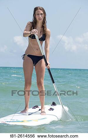 Young girl on paddleboard, Peiscola, Spain View Large Photo Image Stock Photograph - Young girl on paddleboard, Peiscola, Spain. Fotosearch