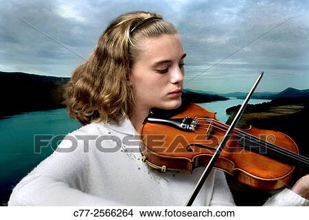 Young girl playing violin View Large Photo Image Picture - Young girl playing violin. Fotosearch