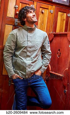 Picture - Young man in a sailboat, galleon. Basque Country. Spain. Fotosearch