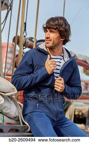Young man in a sailboat, galleon. Basque Country. Spain View Large Photo Image Picture - Young man in a sailboat, galleon. Basque Country. Spain. Fotosearch