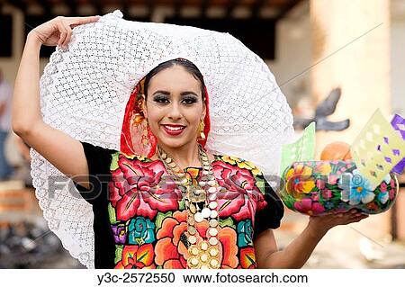 Young Mexican woman in folkloristic outfit. Puerto Vallarta, Jalisco, Mexico. Xiutla Dancers - a folkloristic Mexican dance group in traditional costumes representing the culture and different regions of Mexico. View Large Photo Image Stock Image - Young Mexican woman in folkloristic outfit. Puerto Vallarta, Jalisco, Mexico. Xiutla Dancers - a folkloristic Mexican dance group in traditional costumes representing the culture and different regions of Mexico.. Fotosearch